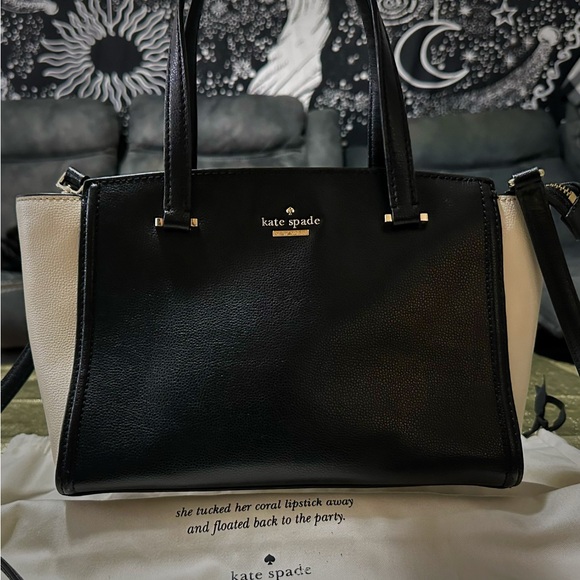 kate spade Handbags - Kate Spade Black and White Satchel with Structured Design